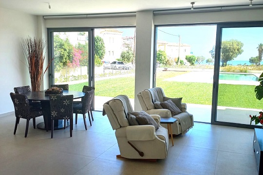 Thumbnail of Villa 3 lounge from and dining area