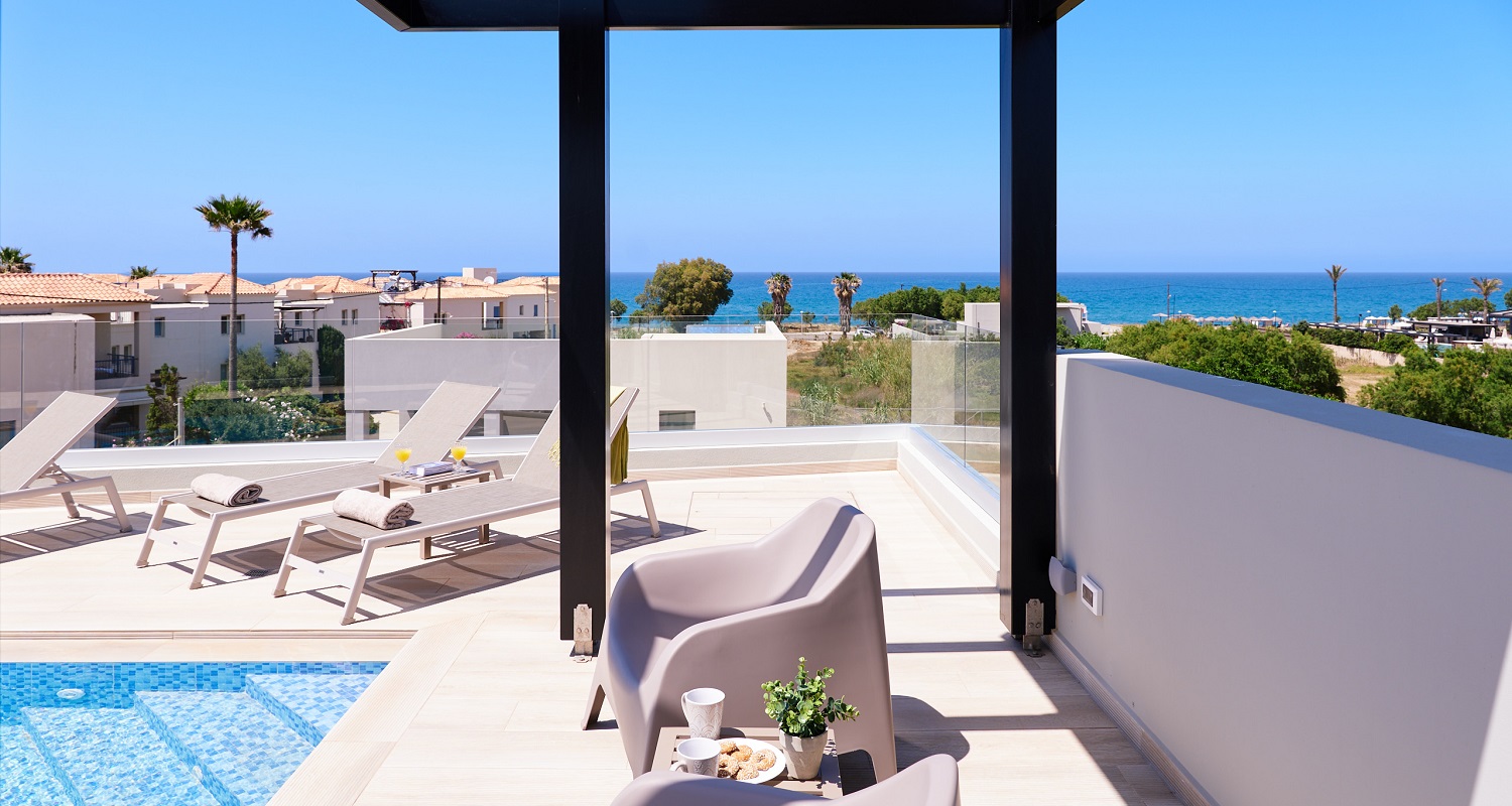 Photo of roof top swimming pool showing seating area